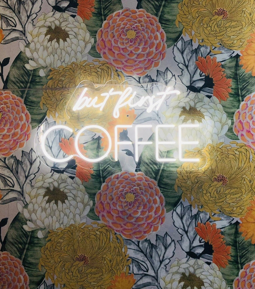 But first coffee neon sign at SentirCafé